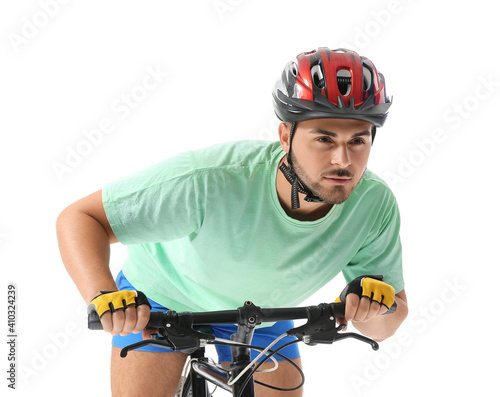 Male cyclist riding bicycle...