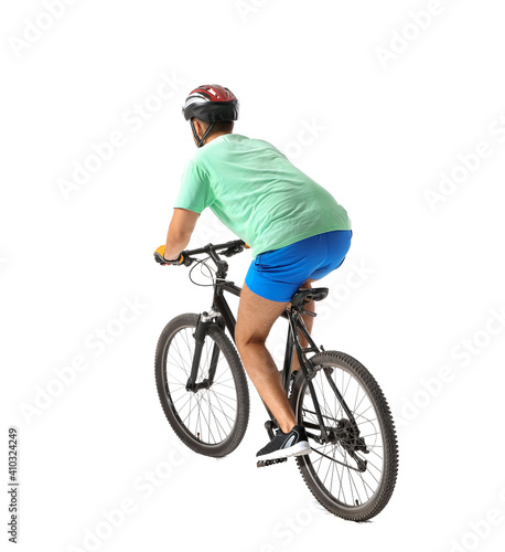 Fototapeta Naklejka Na Ścianę i Meble -  Male cyclist riding bicycle on white background