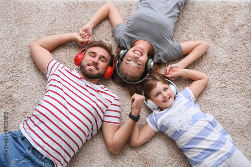 Happy family with headphone...