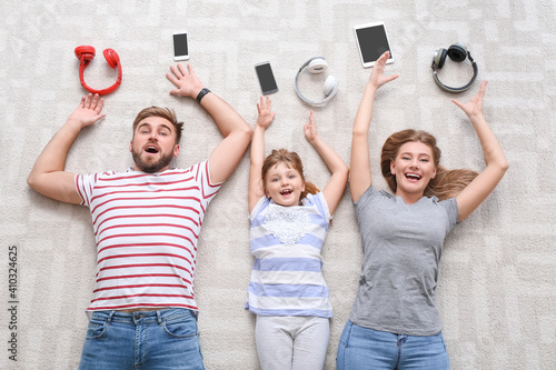 Happy family with modern de...