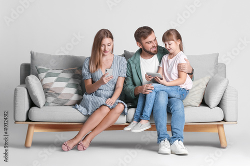 Happy family with modern de...