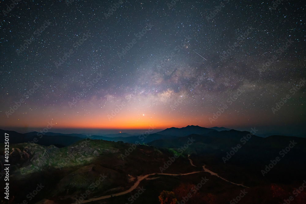 Panorama view universe space shot of milky way galaxy with stars on night sky background at mountains landscape Thailand