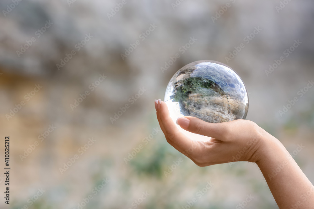 Fortune teller with crystal ball outdoors Fortune teller with crystal ball outdoors