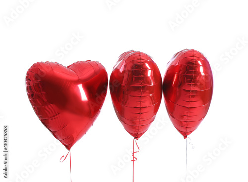 Heart shaped air balloons on white background