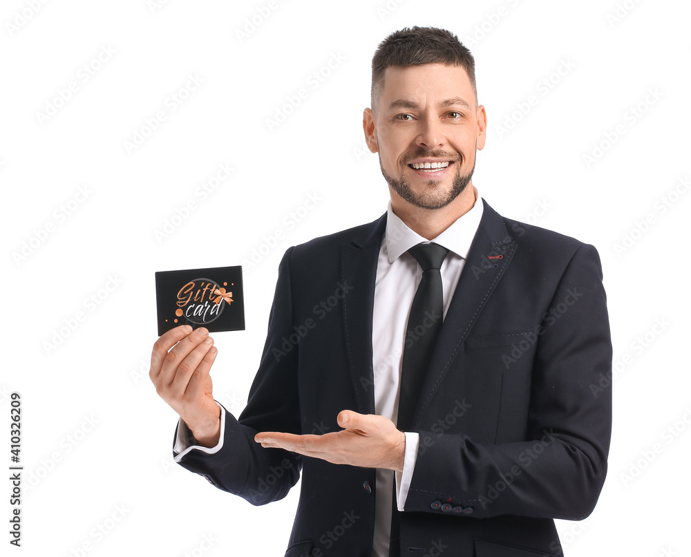 Handsome man with gift card on white background Handsome man with gift card on white background