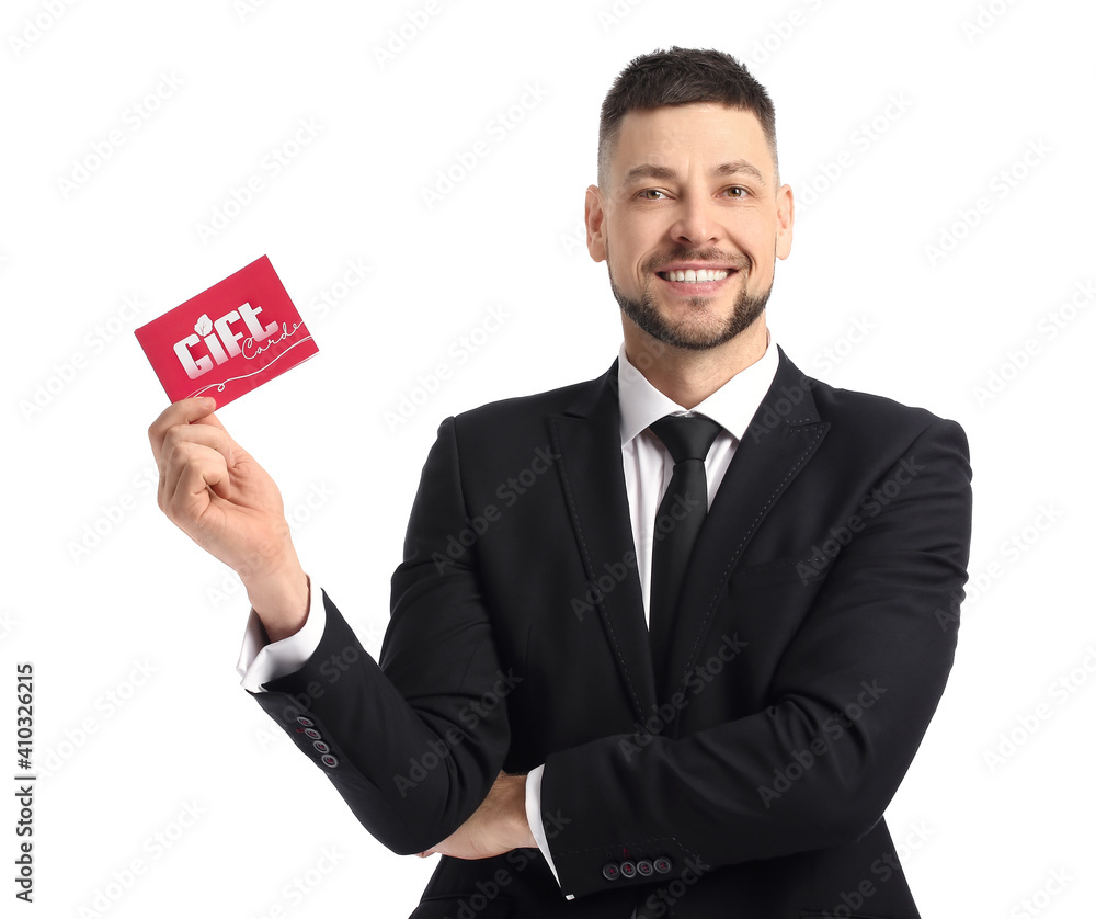 Handsome man with gift card on white background Handsome man with gift card on white background