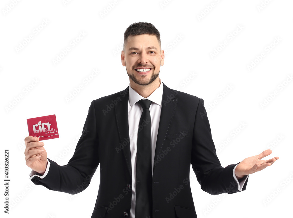 Handsome man with gift card on white background Handsome man with gift card on white background