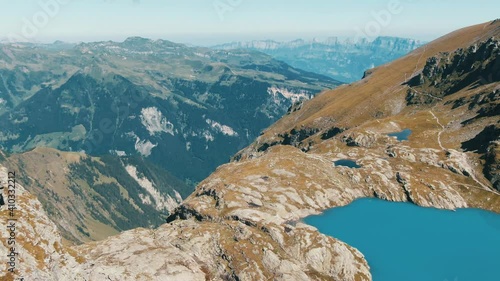 Aerial drone shot of a mountain panorama in Switzerland and the Wildsee along the 5 Lake Hike in Pizol photo