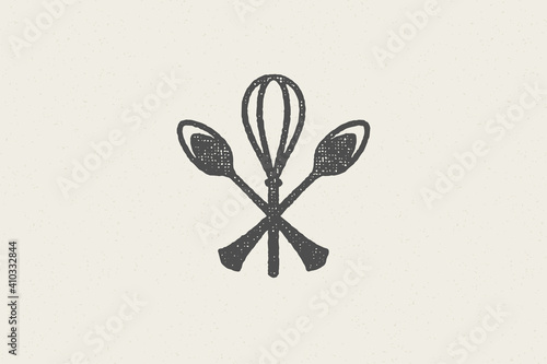 Silhouette of spoons and whisk crossed together symbol for cooking hand drawn stamp effect vector illustration.