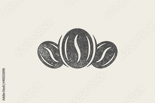 Black silhouette of coffee beans hand drawn stamp effect vector illustration.