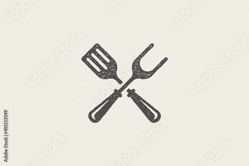 Fork and spatula crossed silhouette as symbol barbecue food preparation hand drawn stamp effect vector illustration.
