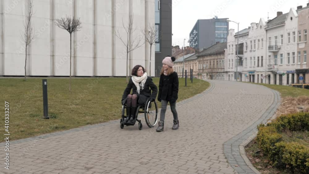 custom made wallpaper toronto digitalSpending time with relatives. Care and love. Mother in wheelchair with her little daughter spending time together outside.