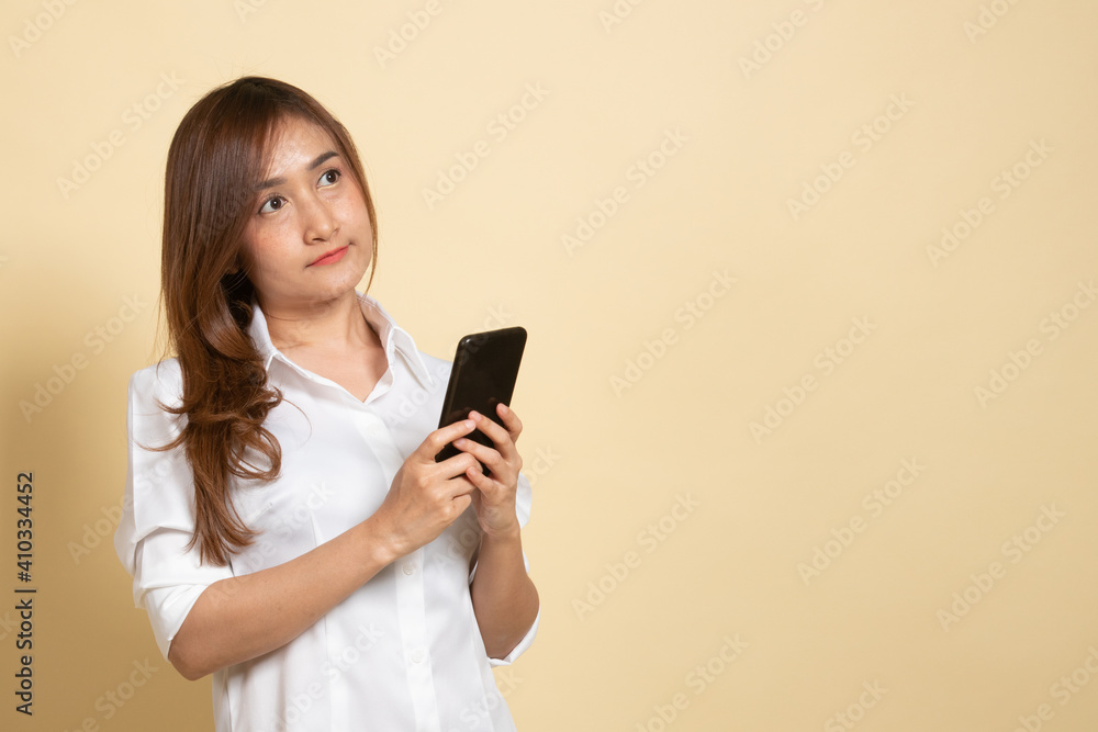 Young Asian woman with mobile phone. Young Asian woman with mobile phone.