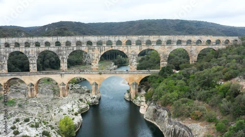 Flight over ancient Pont du Gard aqueduct in France