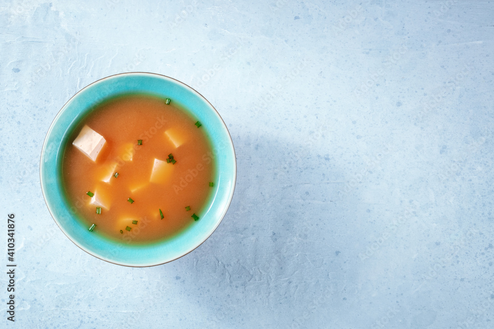 Miso soup with tofu and scallions, top shot with copy space Miso soup with tofu and scallions, top shot with copy space