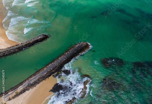 Aerial photograph of Cadgen Creek inlet in Kingscliff, NSW, Australia