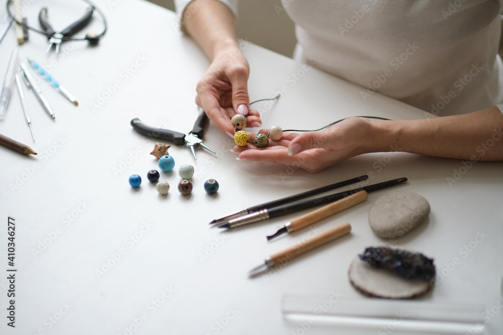 Craft jewelery making with professional tools. A handmade jeweler process, manufacture of jewellery. Craft jewelery making with professional tools. A handmade jeweler process, manufacture of jewellery.