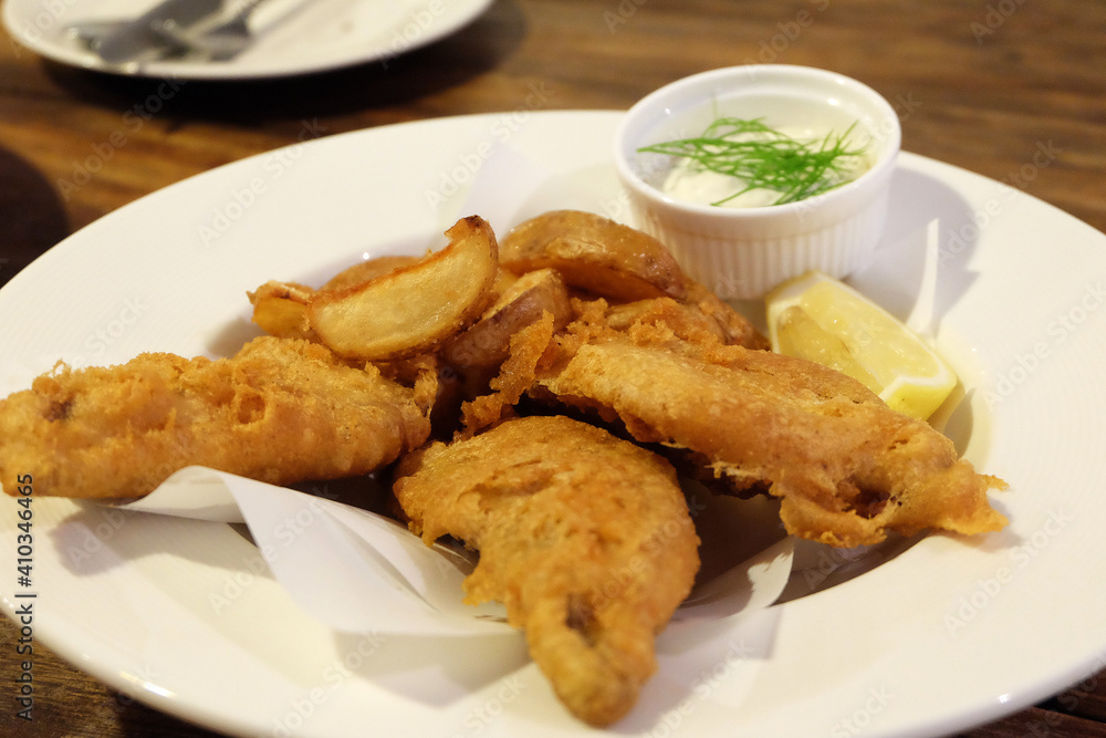 Traditional British Fish and Chips with Tartar sauce Traditional British Fish and Chips with Tartar sauce