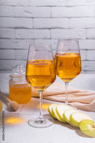 amber or orange wine made from white grapes. in a tall wine glass. Georgian national wine according to old technology