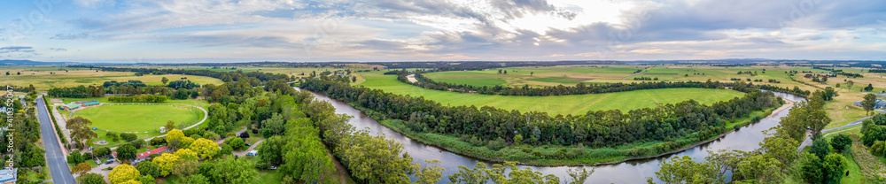 Wide aerial panoramic landscape of the Snowy River and fields in Victoria, Australia