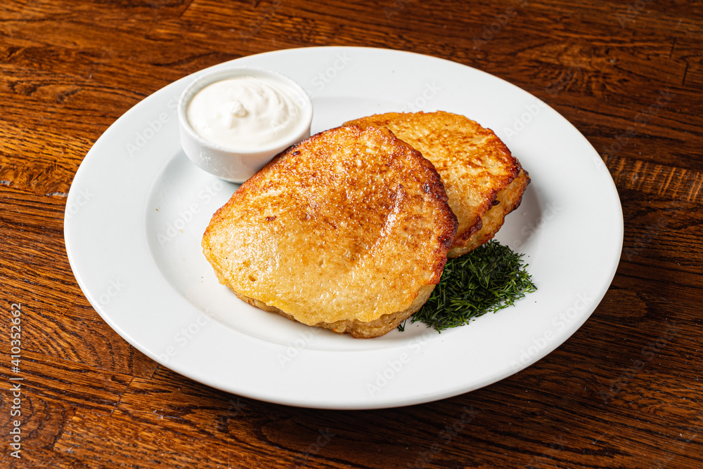 potato pancakes with sour cream potato pancakes with sour cream