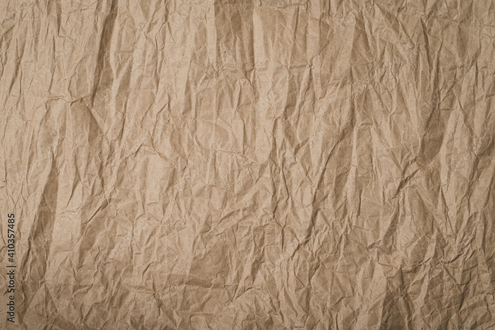 Background Of Brown Crumpled Paper Top View.