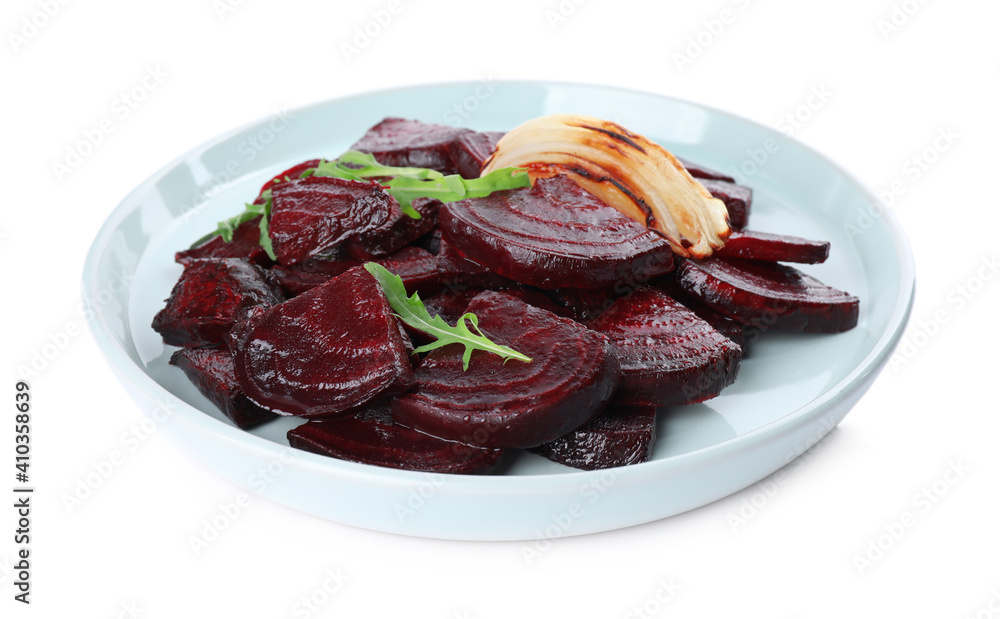 Plate with roasted beetroot slices, arugula and onion isolated on white