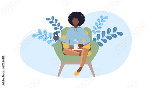 Young afro American woman relaxing at home on chair. Flat Vector Illustration. Female Character, Chatting Online Using Smartphone, Drinking Hot Tea.