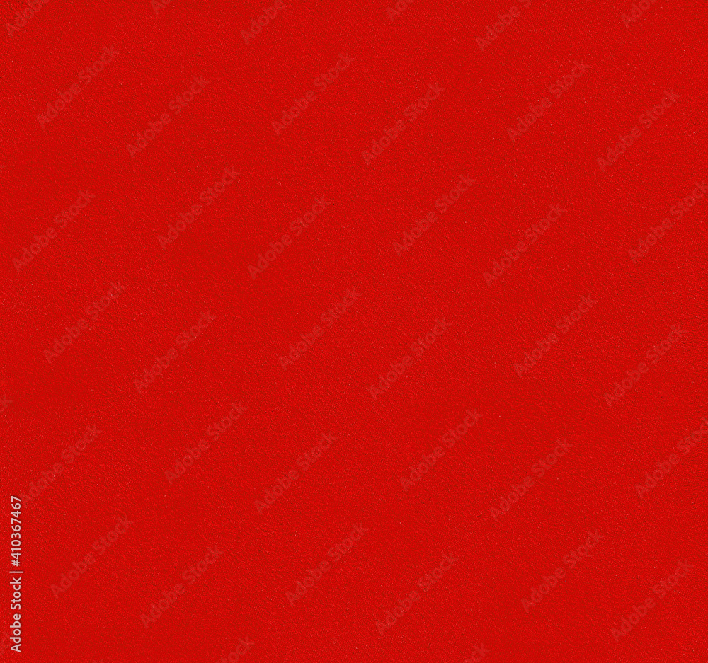 Texture of a bright red fabric. Abstract background. Texture of a bright red fabric. Abstract background.