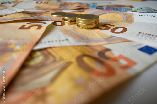 Background of euro notes and coins symbol of the European economy.