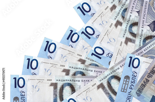 10 Belorussian rubles bills lies in different order isolated on white. Local banking or money making concept photo