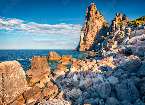Majestic marine scenery. Superb summer view of historical landmark - Pedra Longa. Captivating morning scene of Sardinia island, Italy, Europe. Splendid Mediterranean seascape.