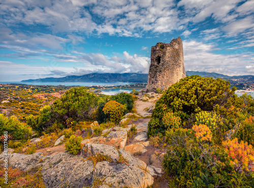 Landscape photography. Wonderful summer scene of Torre di Porto Giunco tower on Carbonara cape. Dramatic morning view of Sardinia island, Italy, Europe. Aerial Mediterranean seascape.