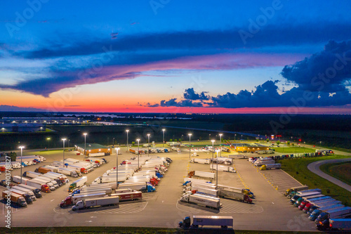 Wilmington, IL - 15 November 2020: Aerial view of a huge parking lot with trucks in Wilmington near Chicago, Illinois, United States of America. photo