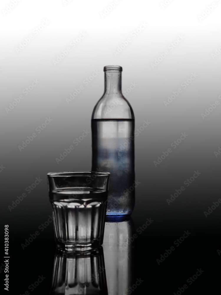 Crystal bottle and glass of water