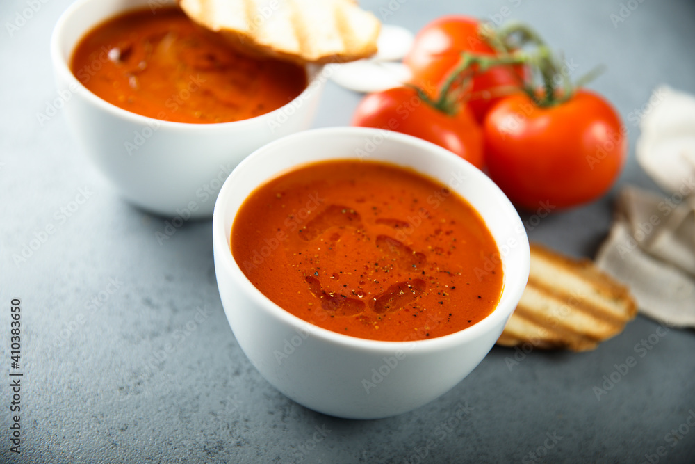Homemade spicy tomato soup with grilled bread Homemade spicy tomato soup with grilled bread