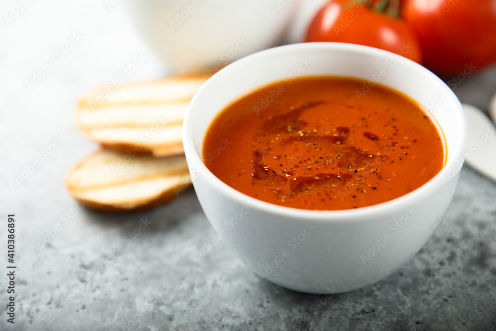 Homemade spicy tomato soup with grilled bread Homemade spicy tomato soup with grilled bread