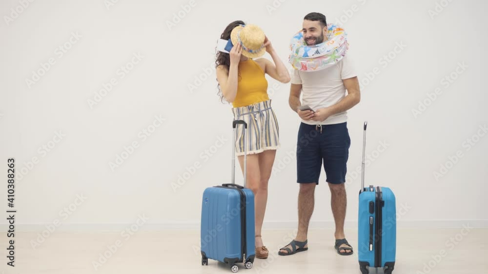 4k slowmotion video of couple planning to go to the seaside. 4k slowmotion video of couple planning to go to the seaside.