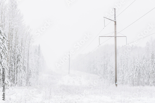 power line in the forest. Winter