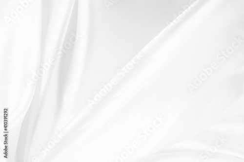 white satin background very clean and smooth with soft wave design