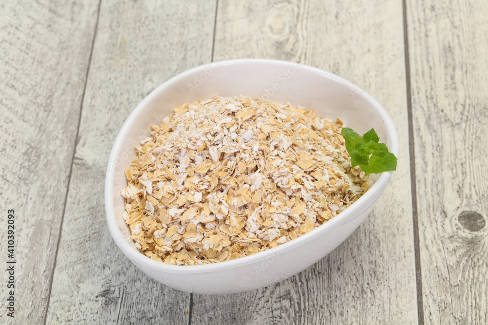 Raw oats in the bowl Raw oats in the bowl