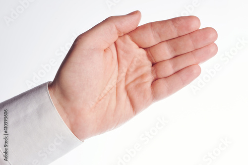 Open hand palm in white shirt