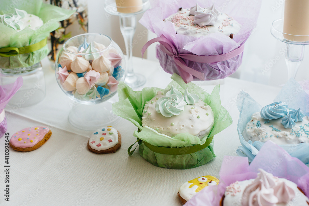 Beautiful Easter cakes on a decorated light table. A light holiday of Easter. Beautiful Easter cakes on a decorated light table. A light holiday of Easter.