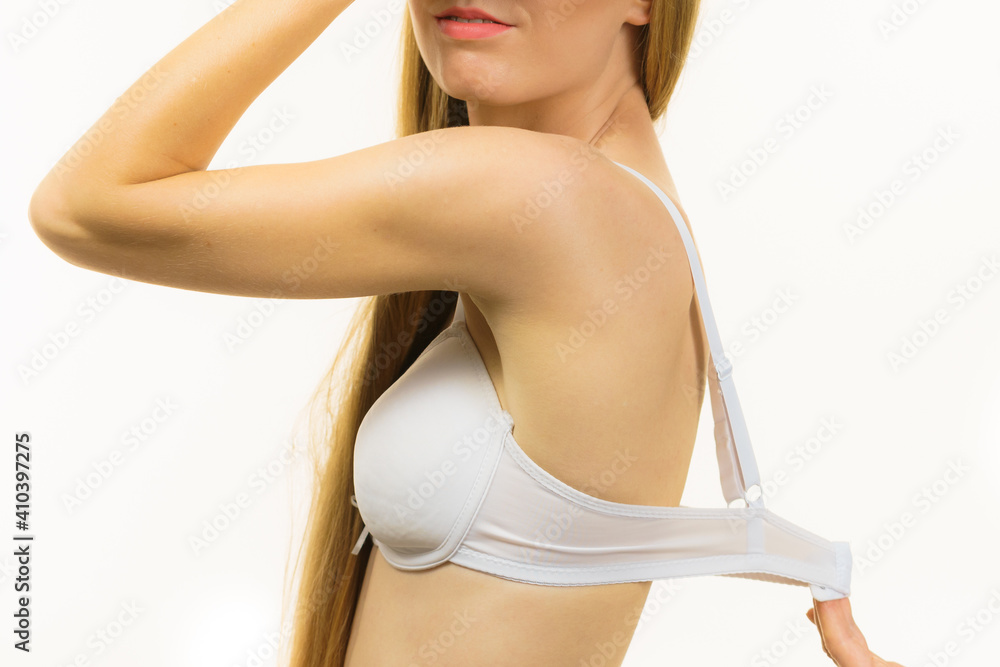 Woman wearing too big bra Stock Photo