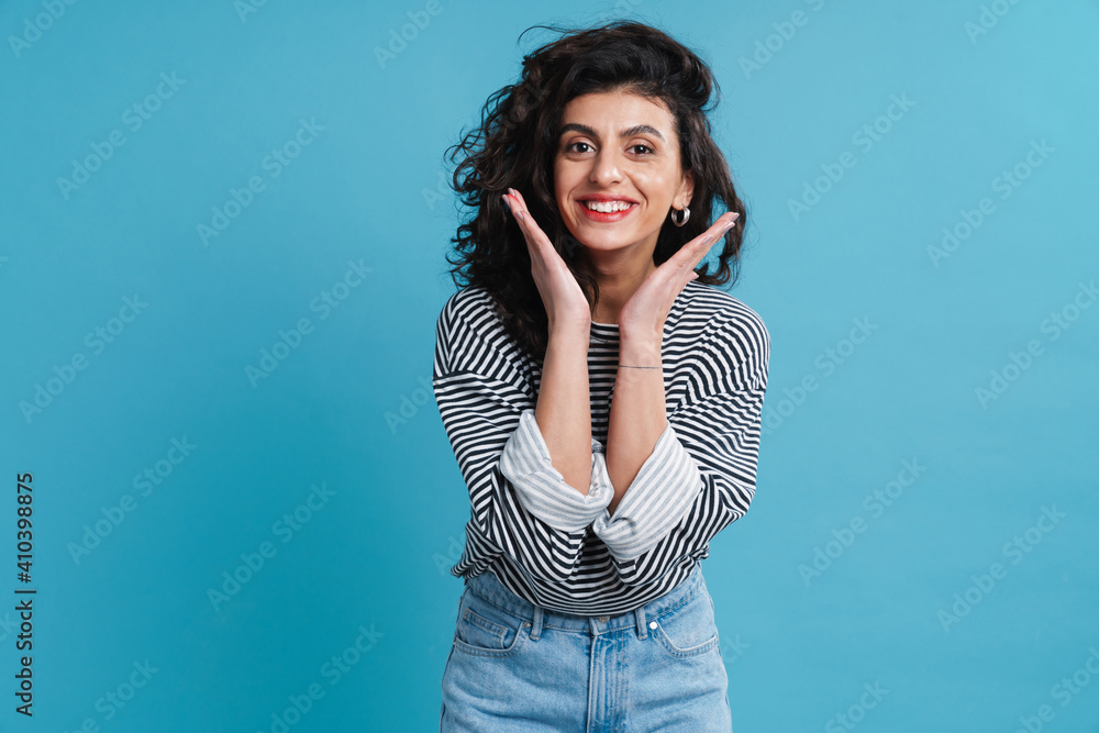 Attractive smiling young woman posing isolated Attractive smiling young woman posing isolated