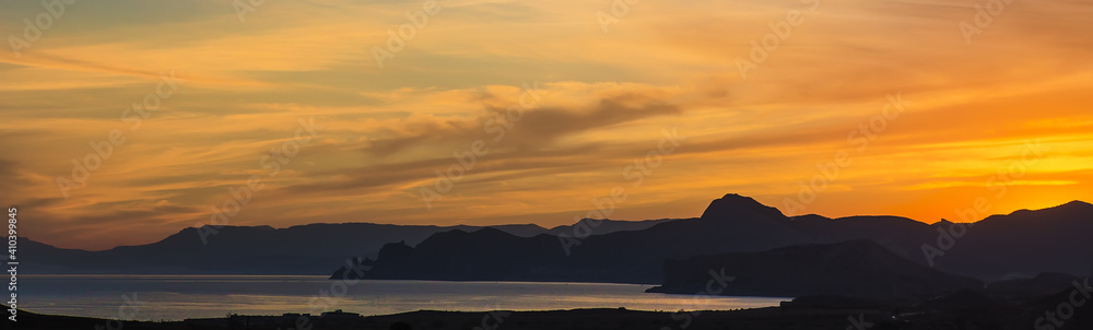 Beautiful sunset over the sea lagoon in the highlands.