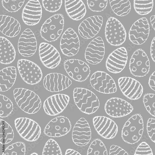 Chalk Easter eggs pattern. Children drawing eggs hand drawn wax crayons art on grey. Crayon style Easter print. Whitepastel crayons freehand drawn egg background. Fabric Easter texture.Chalk eggs.