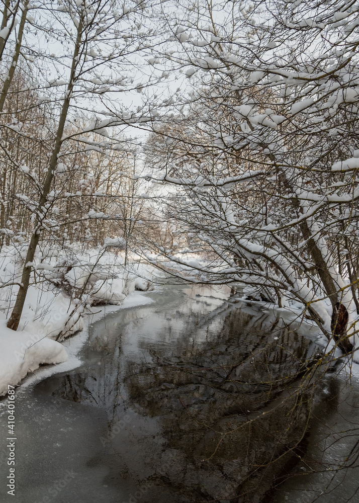 Small river in winter. Small river in winter.