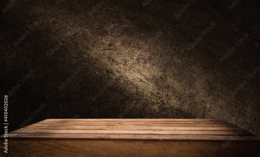dark blue background, dark wall background. Empty workplace in front of abstract package. dark blue background, dark wall background. Empty workplace in front of abstract package.