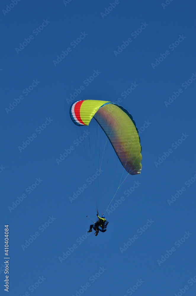paragliding alone in blue sky without any clouds paragliding alone in blue sky without any clouds